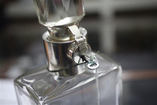 A George V silver mounted plain glass lockable decanter by Asprey & Co Ltd, 32.5cm.